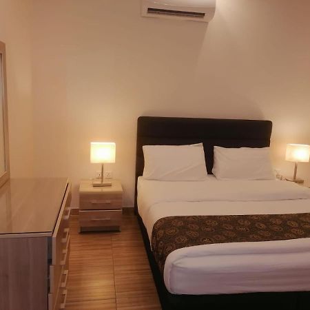 Al-Ahlam Hotel Apartments Акаба Екстериор снимка